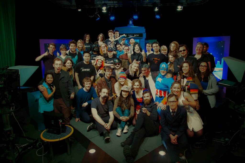 A scene from Dean's community radio and TV days. Whole cast photo from the community TV show Live On Bowen.