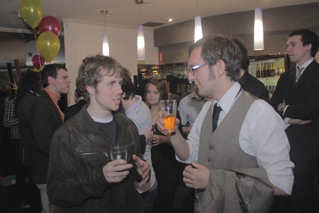 A scene from Dean's community radio and TV days. Left to right: Dean Watson and Timothy Cuthell. Wrap party for the community TV show Live On Bowen.