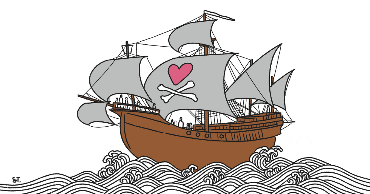 A pirate ship with a heart and crossbones on one of the masts.